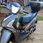 sym st 125 comme neuf